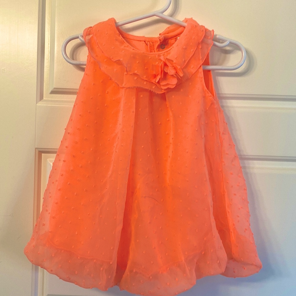 Bright orange onsie with headband